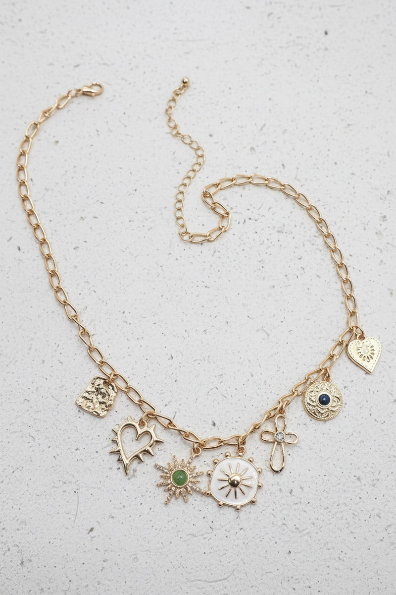 1. Cross Sunburst Stone Charm Necklace